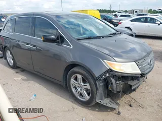 2012 Honda Odyssey Touring с VIN 5FNRL5H9XCB038744, выставлен на аукционе IAAI как лот 42224282 с пробегом 202 035 миль миль и . История ставок и продаж доступна на DreamBid. Изображение 1.