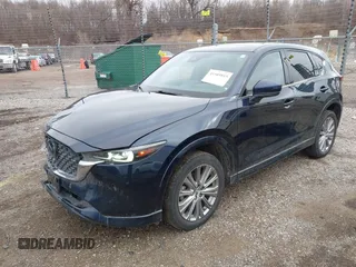 2023 Mazda CX-5 Signature with VIN JM3KFBXY5P0251046, listed as a IAAI auction lot 41505815 with 37,594 mi miles and . Bid and sale history available at carsss.com. Image 17.