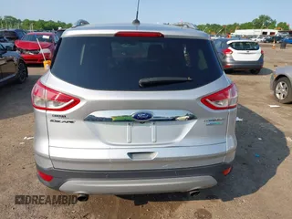 2015 Ford Escape Titanium z VIN 1FMCU0J90FUC02039, wystawiony jako IAAI lot #42369882 z przebiegiem 156 287 mil mil oraz . Historia ofert i sprzedaży dostępna na DreamBid. Obrazek 15.