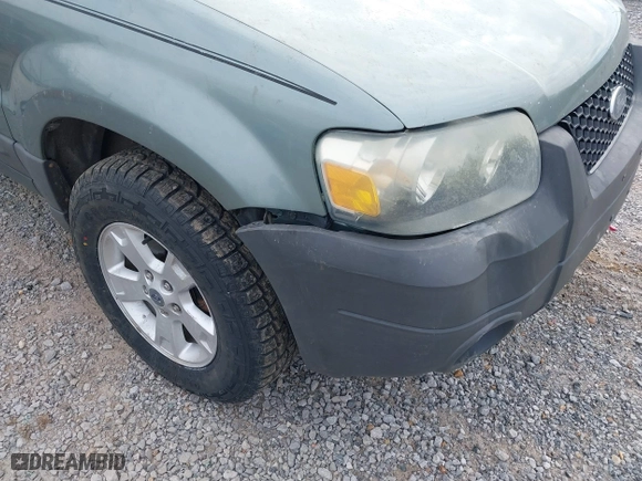2007 Ford Escape XLT with VIN 1FMYU03107KA50631, listed as a IAAI auction lot 41374784 with 174,870 mi miles. Bid and sale history available at carsss.com. Image 12.