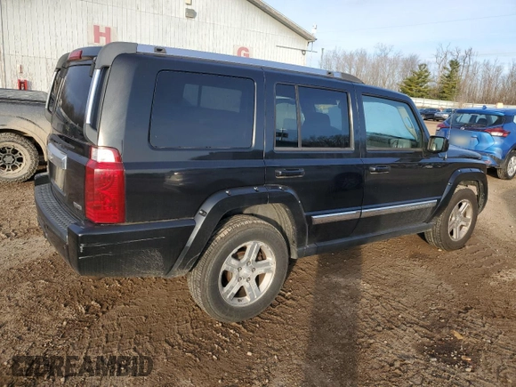 2010 Jeep Commander Limited with VIN 1J4RG5GT6AC113462, listed as a Copart auction lot 82400044 with 189,168 mi miles and Salvage title. Bid and sale history available at DreamBid. Image 3.