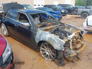2013 Chrysler 300 C z VIN 2C3CCAET3DH534385, wystawiony jako IAAI lot #42258709 z przebiegiem Nie podano mil oraz . Historia ofert i sprzedaży dostępna na DreamBid. Obrazek 1.