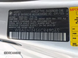 2006 BMW 6 Series 650Ci with VIN WBAEH13456CR49065, listed as a IAAI auction lot 41840327 with 128,451 mi miles. Bid and sale history available at carsss.com. Image 9.