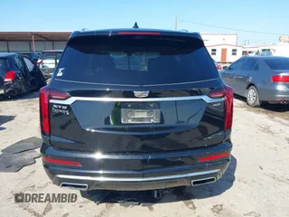 2020 Cadillac XT6 FWD Premium Luxury z VIN 1GYKPERS0LZ232338, wystawiony jako IAAI lot #41845562 z przebiegiem 86 839 mil mil oraz . Historia ofert i sprzedaży dostępna na DreamBid. Obrazek 16.
