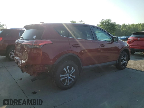 2018 Toyota RAV4 LE with VIN 2T3BFREV7JW723938, listed as a Copart auction lot 62814195 with 107,051 mi miles and Salvage title. Bid and sale history available at DreamBid. Image 3.