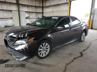 2019 Toyota Camry LE with VIN 4T1B11HK3KU290548, listed as a Copart auction lot 48233685 with 105,700 mi miles and Salvage Title. Bid and sale history available at carsss.com. Image 1.