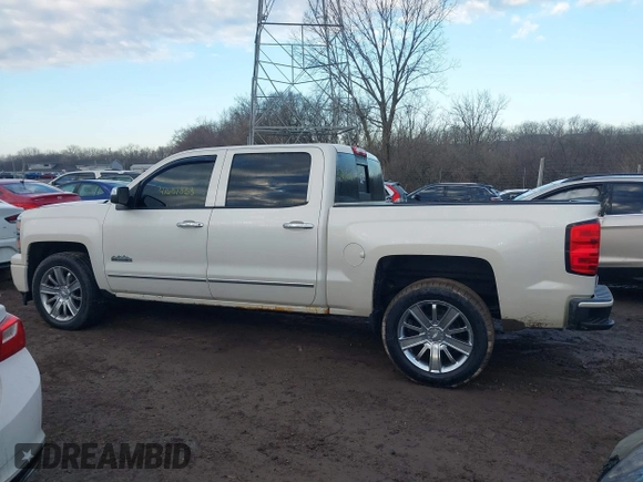 2014 Chevrolet Silverado 1500 High Country with VIN 3GCUKTEC5EG407573, listed as a IAAI auction lot 41651363 with 136,239 mi miles. Bid and sale history available at carsss.com. Image 14.