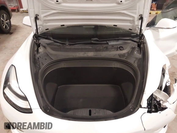 2018 Tesla Model 3 Long Range Battery with VIN 5YJ3E1EB5JF084446, listed as a IAAI auction lot 41209852 with 70,125 mi miles and . Bid and sale history available at DreamBid. Image 10.