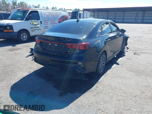 2023 Kia Forte GT-Line with VIN 3KPF54AD6PE589500, listed as a IAAI auction lot 41604455 with 31,444 mi miles. Bid and sale history available at carsss.com. Image 4.