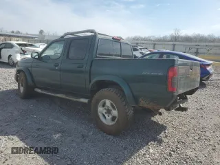 2000 Nissan Frontier XE with VIN 1N6ED27Y4YC382199, listed as a Copart auction lot 47127045 with 207,449 mi miles and Salvage title. Bid and sale history available at DreamBid. Image 2.
