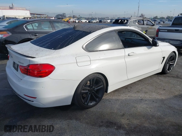 2014 BMW 4 Series 428i with VIN WBA3N3C5XEF710869, listed as a IAAI auction lot 40984116 with 115,958 mi miles and . Bid and sale history available at DreamBid. Image 4.