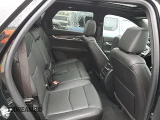 2021 Cadillac XT5 AWD Sport z VIN 1GYKNGRS3MZ158562, wystawiony jako Copart lot #43593295 z przebiegiem 32 293 mil mil oraz Szkoda całkowita • Salvage title. Historia ofert i sprzedaży dostępna na DreamBid. Obrazek 10.