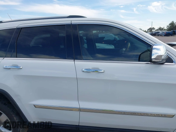 2013 Jeep Grand Cherokee Overland with VIN 1C4RJECT6DC533434, listed as a IAAI auction lot 41656116 with 122,809 mi miles. Bid and sale history available at carsss.com. Image 14.