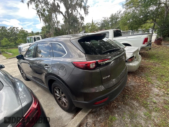2016 Mazda CX-9 Touring с VIN JM3TCACY7G0115773, выставлен на аукционе Copart как лот 60667065 с пробегом 119 432 миль миль и Чистый • Clean title. История ставок и продаж доступна на DreamBid. Изображение 3.