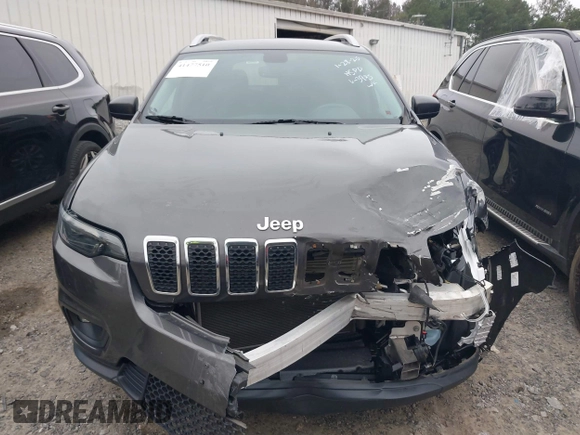 2019 Jeep Cherokee Latitude Plus with VIN 1C4PJMLB2KD113945, listed as a IAAI auction lot 41477510 with 38,143 mi miles and . Bid and sale history available at DreamBid. Image 12.