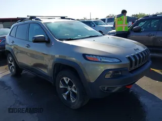 2017 Jeep Cherokee Trailhawk L Plus with VIN 1C4PJMBB6HW654172, listed as a IAAI auction lot 41851236 with 104,263 mi miles. Bid and sale history available at carsss.com. Image 1.