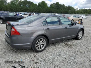 2012 Ford Fusion SEL with VIN 3FAHP0JA4CR292185, listed as a Copart auction lot 60916345 with 212,685 mi miles and Salvage title. Bid and sale history available at DreamBid. Image 3.