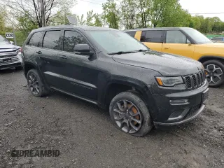 2021 Jeep Grand Cherokee High Altitude with VIN 1C4RJFCG3MC527325, listed as a Copart auction lot 55832875 with 64,338 mi miles and Salvage title. Bid and sale history available at DreamBid. Image 4.