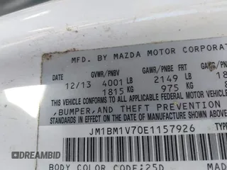 2014 Mazda 3 i Touring with VIN JM1BM1V70E1157926, listed as a IAAI auction lot 41888625 with 109,246 mi miles and . Bid and sale history available at DreamBid. Image 9.