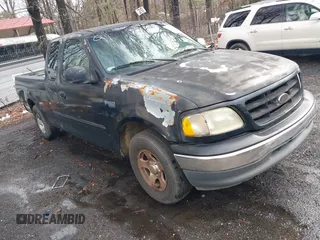 2002 Ford F-150 XL with VIN 1FTRX17252NA19861, listed as a IAAI auction lot 41304648 with 279,277 mi miles. Bid and sale history available at carsss.com. Image 1.