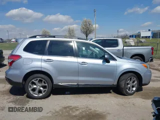 2016 Subaru Forester 2.5i Touring with VIN JF2SJAVC8GH493549, listed as a IAAI auction lot 41875775 with 74,767 mi miles. Bid and sale history available at carsss.com. Image 14.