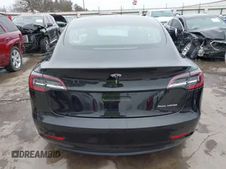 2018 Tesla Model 3 Long Range Battery with VIN 5YJ3E1EB3JF090567, listed as a IAAI auction lot 41568312 with 35,327 mi miles and . Bid and sale history available at DreamBid. Image 17.
