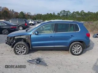 2017 Volkswagen Tiguan Wolfsburg Edition with VIN WVGRV7AX6HW504313, listed as a IAAI auction lot 40950812 with 149,884 mi miles and . Bid and sale history available at DreamBid. Image 14.