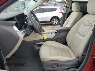 2024 Cadillac XT6 FWD Premium Luxury with VIN 1GYKPCRS1RZ700168, listed as a Copart auction lot 59327055 with 21,001 mi miles and Salvage title. Bid and sale history available at DreamBid. Image 7.