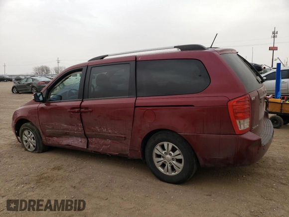 2012 Kia Sedona LX with VIN KNDMG4C77C6501093, listed as a Copart auction lot 48918985 with 194,364 mi miles and Salvage Title. Bid and sale history available at carsss.com. Image 2.