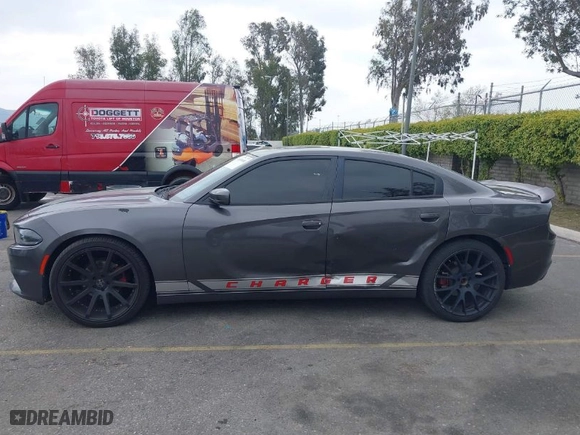 2019 Dodge Charger SXT with VIN 2C3CDXBG2KH643442, listed as a IAAI auction lot 41896681 with 104,061 mi miles. Bid and sale history available at carsss.com. Image 14.