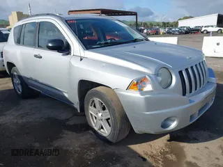 2008 Jeep Compass Sport with VIN 1J8FT47W18D728894, listed as a IAAI auction lot 41925519 with 154,124 mi miles. Bid and sale history available at carsss.com. Image 1.