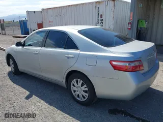 2007 Toyota Camry CE with VIN 4T1BE46K07U532647, listed as a IAAI auction lot 42075663 with 125,736 mi miles. Bid and sale history available at carsss.com. Image 3.