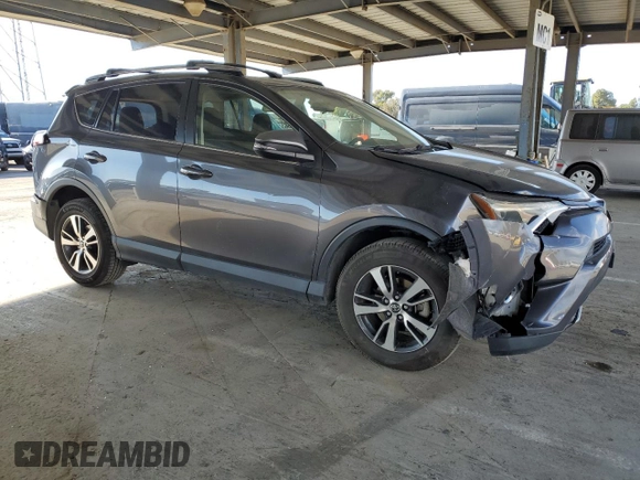 2018 Toyota RAV4 XLE with VIN JTMRFREV5JJ739620, listed as a Copart auction lot 48218185 with 82,885 mi miles and Salvage Title. Bid and sale history available at DreamBid. Image 4.