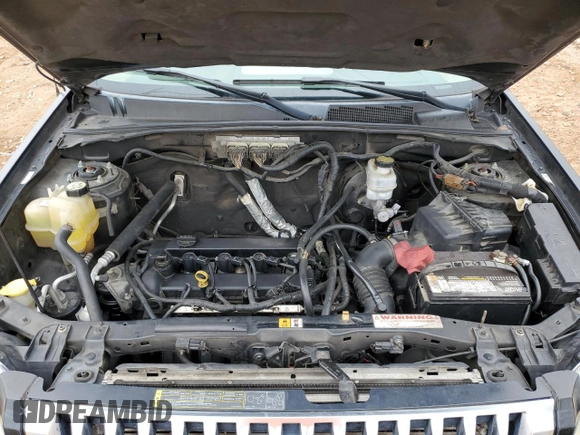 2009 Mercury Mariner Premier z VIN 4M2CU87749KJ12895, wystawiony jako Copart lot #44384555 z przebiegiem 278 370 mil mil oraz Tytuł czysty. Historia ofert i sprzedaży dostępna na DreamBid. Obrazek 12.