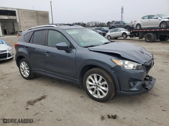 2013 Mazda CX-5 Grand Touring with VIN JM3KE2DE6D0141096, listed as a Copart auction lot 44883205 with 132,417 mi miles and Salvage Title. Bid and sale history available at carsss.com. Image 4.