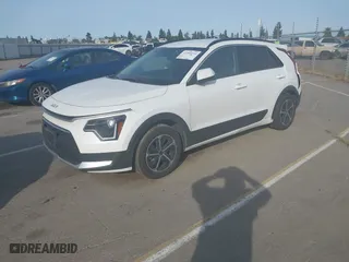 2023 Kia Niro LX with VIN KNDCP3LE4P5101606, listed as a IAAI auction lot 41960334 with 64,616 mi miles. Bid and sale history available at carsss.com. Image 2.