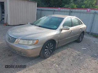 2007 Hyundai Azera SE z VIN KMHFC46F67A162638, wystawiony jako IAAI lot #42053153 z przebiegiem 130 133 mil mil oraz . Historia ofert i sprzedaży dostępna na DreamBid. Obrazek 2.