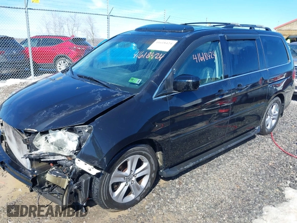 2008 Honda Odyssey Touring with VIN 5FNRL38948B029193, listed as a IAAI auction lot 41618424 with 219,964 mi miles. Bid and sale history available at carsss.com. Image 2.