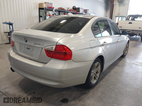 2008 BMW 3 Series 328xi with VIN WBAVC93598K040387, listed as a IAAI auction lot 42796696 with Not provided miles and . Bid and sale history available at DreamBid. Image 4.