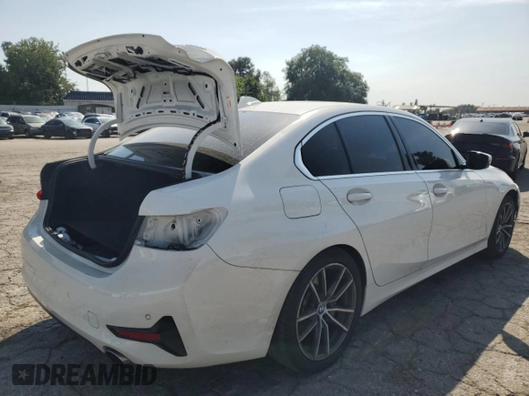 2021 BMW 3 Series 330i with VIN 3MW5R1J0XM8C09626, listed as a Copart auction lot 52205805 with 52,261 mi miles and Salvage title. Bid and sale history available at DreamBid. Image 3.