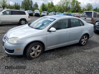 2009 Volkswagen Jetta SE с VIN 3VWRM71K99M156016, выставлен на аукционе Copart как лот 57711095 с пробегом 206 869 миль миль и Чистый • Clean title. История ставок и продаж доступна на DreamBid. Изображение 1.