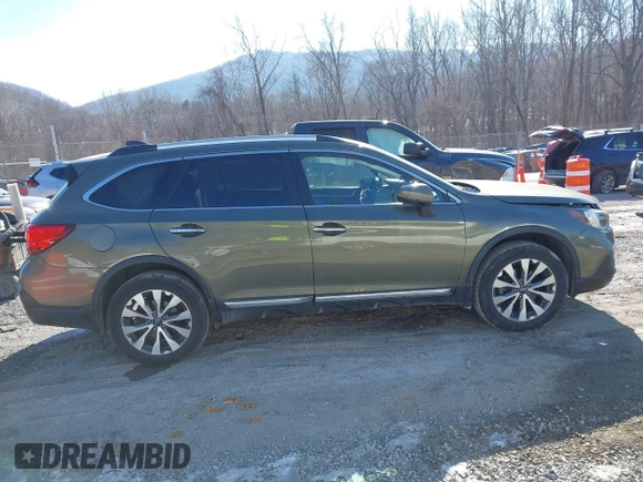 2019 Subaru Outback Touring with VIN 4S4BSATC7K3272301, listed as a IAAI auction lot 41318172 with 102,417 mi miles and . Bid and sale history available at DreamBid. Image 13.