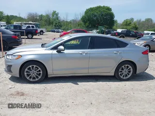 2020 Ford Fusion SE z VIN 3FA6P0HD6LR144501, wystawiony jako IAAI lot #42715066 z przebiegiem 204 983 mil mil oraz . Historia ofert i sprzedaży dostępna na DreamBid. Obrazek 14.