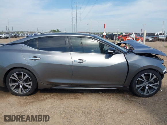 2016 Nissan Maxima SL z VIN 1N4AA6AP3GC392390, wystawiony jako IAAI lot #42260676 z przebiegiem 135 259 mil mil oraz . Historia ofert i sprzedaży dostępna na DreamBid. Obrazek 14.