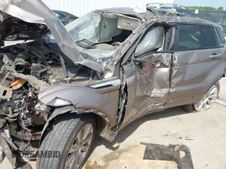 2015 Land Rover Range Rover Evoque Prestige with VIN SALVV2BG5FH001029, listed as a IAAI auction lot 42015106 with Not provided miles and . Bid and sale history available at DreamBid. Image 6.