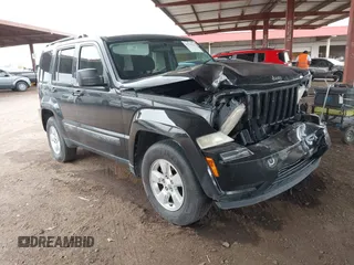 2012 Jeep Liberty Sport z VIN 1C4PJMAK8CW153861, wystawiony jako IAAI lot #41774221 z przebiegiem 135 698 mil mil oraz . Historia ofert i sprzedaży dostępna na DreamBid. Obrazek 1.