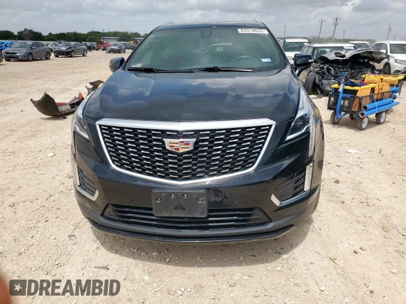 2021 Cadillac XT5 FWD Luxury with VIN 1GYKNAR42MZ120996, listed as a Copart auction lot 63314655 with 49,977 mi miles and Salvage title. Bid and sale history available at DreamBid. Image 5.