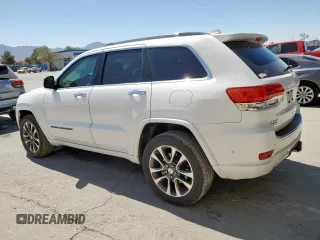 2017 Jeep Grand Cherokee Overland z VIN 1C4RJFCT5HC612721, wystawiony jako Copart lot #57652865 z przebiegiem 103 690 mil mil oraz Tytuł czysty. Historia ofert i sprzedaży dostępna na DreamBid. Obrazek 2.
