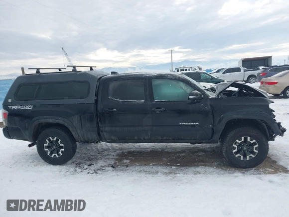 2023 Toyota Tacoma SR5 z VIN 3TMDZ5BN3PM169160, wystawiony jako IAAI lot #41276992 z przebiegiem 5 228 mil mil oraz . Historia ofert i sprzedaży dostępna na DreamBid. Obrazek 14.