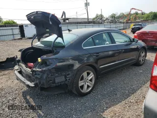 2013 Volkswagen CC Sport Plus z VIN WVWBP7AN3DE524615, wystawiony jako Copart lot #57506575 z przebiegiem 153 641 mil mil oraz Szkoda całkowita • Salvage title. Historia ofert i sprzedaży dostępna na DreamBid. Obrazek 3.